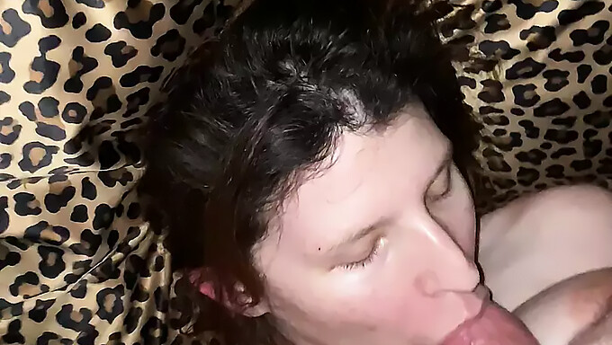 Teen gives a deep throat blowjob and receives a cumshot on her big breasts