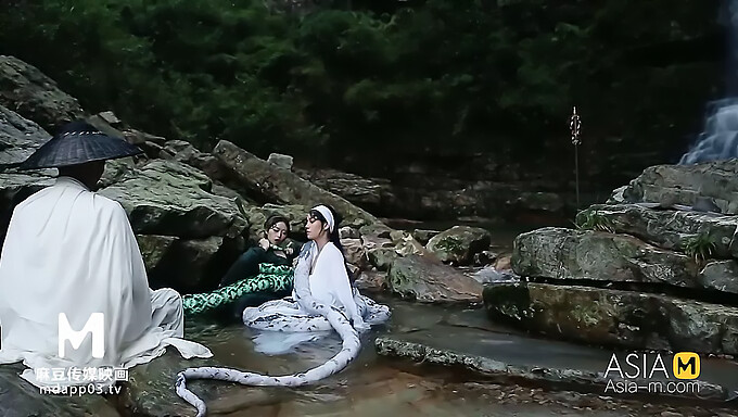 Vintage green and white snake sex with a brunette