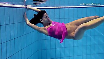 Busty Zlata swims in pool and underwater